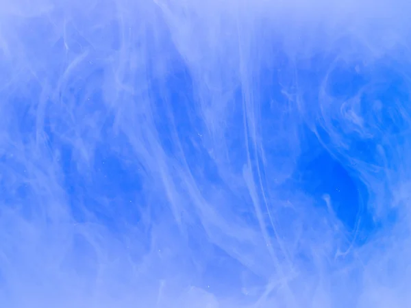 Abstract colored background. Blue smoke, ink in water, the patterns of the universe. Abstract movement, frozen multicolor flow of paint. Horizontal photo with soft focus, blurred backdrop — Stock Photo, Image