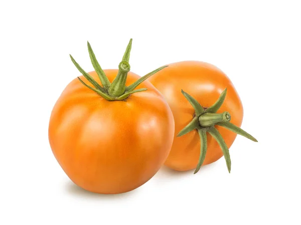 Zwei gelbe Tomaten mit grünem Schwanz isoliert auf weißem Hintergrund. retuschierte Tomate mit Textur, Blendung und Schatten. Nahaufnahme. — Stockfoto