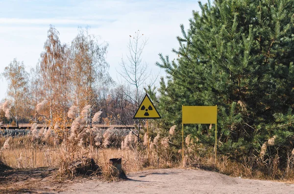 sign of radioactive contamination in a forest in Chernobyl