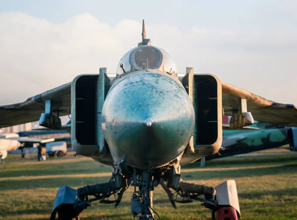 old army military combat fighter aircraft at the airport