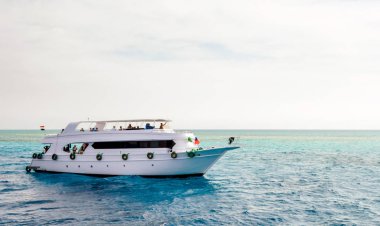 white cruise tourist boat in the Red Sea in Egypt