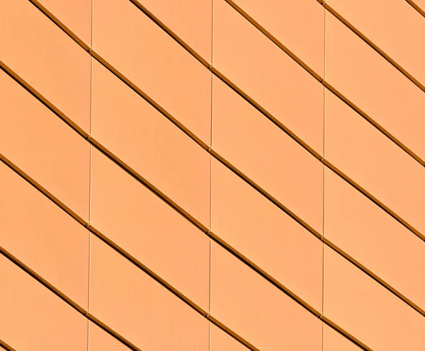 Fragmento de la pared de un edificio amarillo moderno —  Fotos de Stock