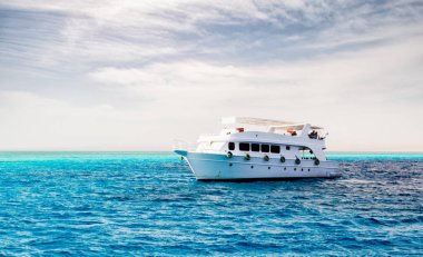 white cruise tourist boat in the Red Sea in Egypt