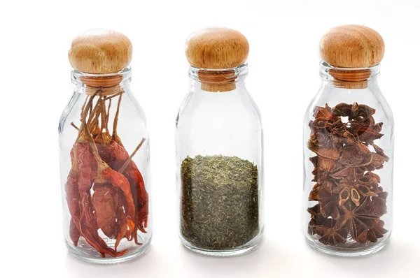 Set of assorted colorful spices in glass bottle isolated on whit — Stock Photo, Image