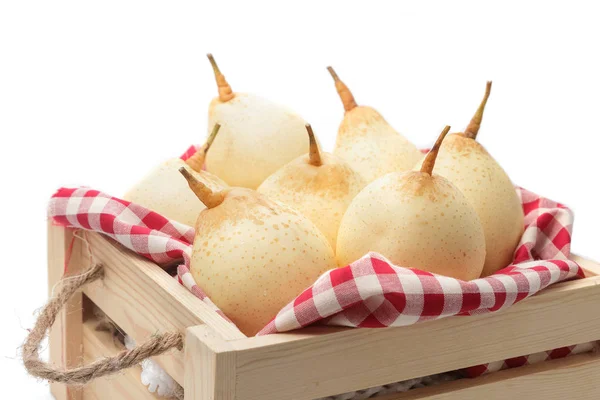 Fresh chinese pears on wooden crate on white — Stock Photo, Image