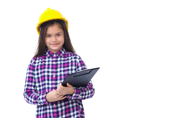 小女孩用黄色头盔和剪贴板上白色孤立 — 图库照片
