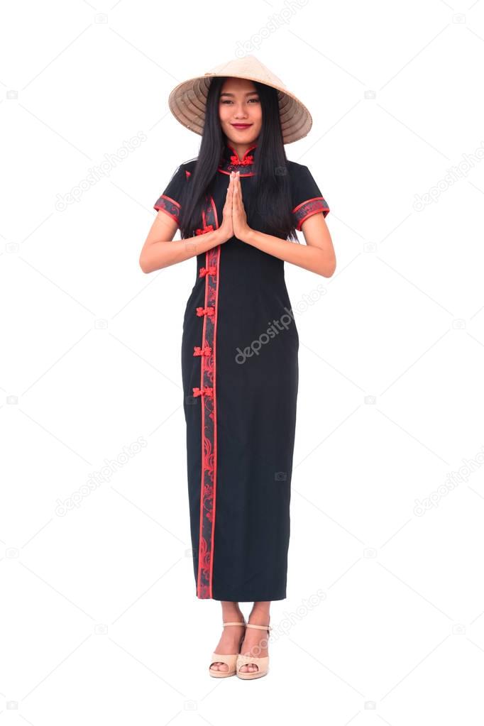 Asian long hair woman with vietnam hat in a traditional greeting