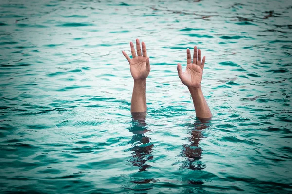 Drowning victims, PersonDrowning victims, Hand of drowning man n