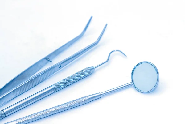 Dental tools in a sterile medical light — Stock Photo, Image