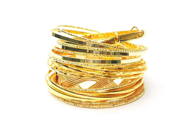 Golden jewelry with precious stones — Stock Photo, Image