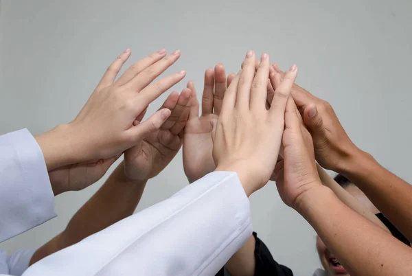 Doctors and nurses in a medical team stacking hands,Medical team — Stock Photo, Image
