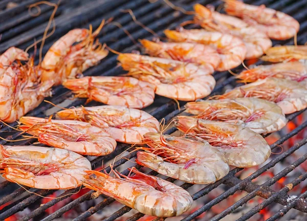 Prawn grilled barbecue seafood on charcoal stove. Thai street se