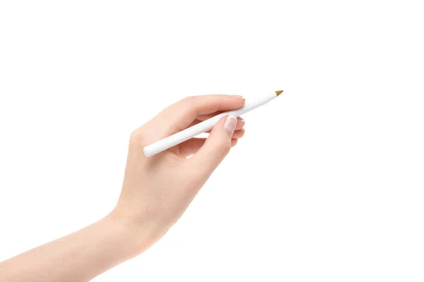 Γυναικείο χέρι κρατά ένα στυλό πάνω σε λευκό φόντο. — Φωτογραφία Αρχείου