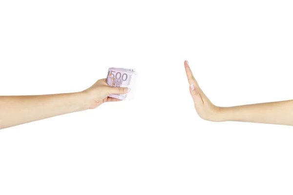 Women's hand is giving money another hand on white background. — Stock Photo, Image