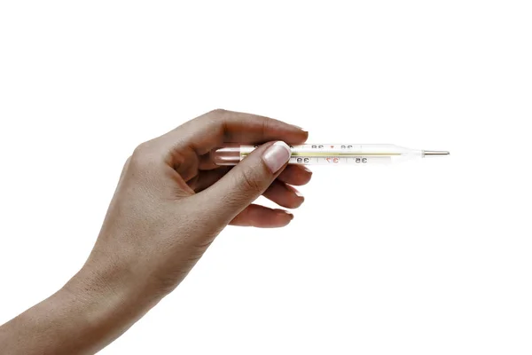 African female hand holds thermometer on a white background. — Stock Photo, Image