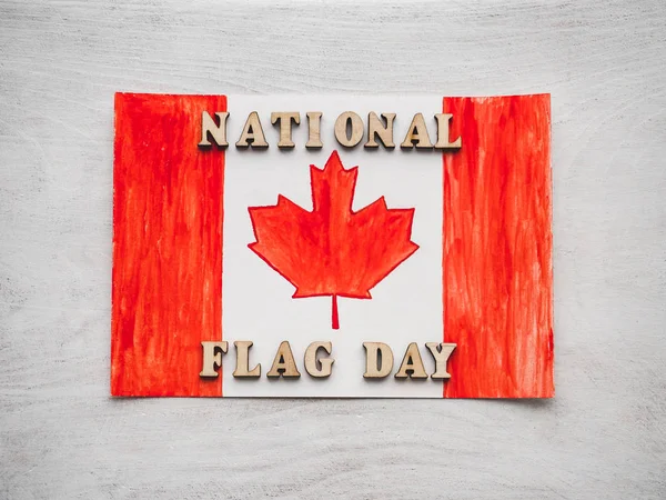 Dessin du drapeau canadien et lettres en bois — Photo