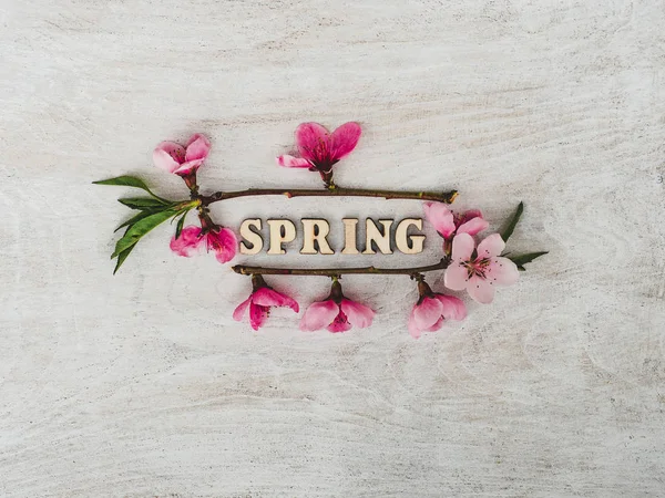 Bright flowers lying on a white table — Stock Photo, Image