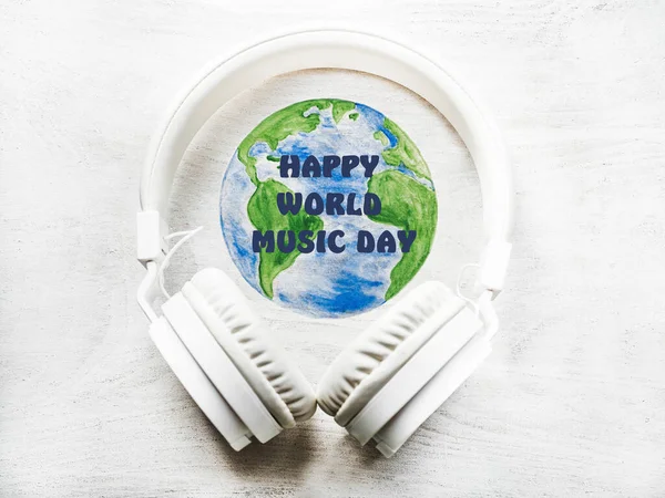 World Music Day. Beautiful greeting card. Isolated background, close-up, view from above. Congratulations for relatives, friends and colleagues