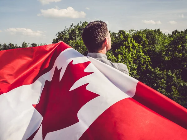 Attractive Man Holding Canadian Flag Blue Sky Background Clear Sunny — Stock Photo, Image