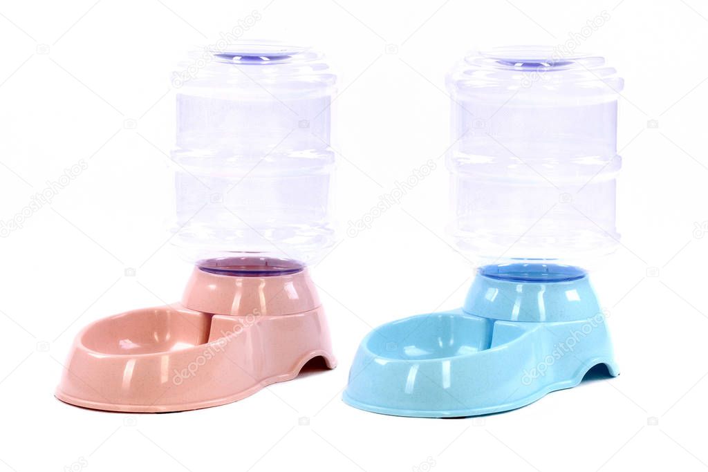 Pet Drinking Water Fountain and Bowl. Plastic Bottle with liquid.