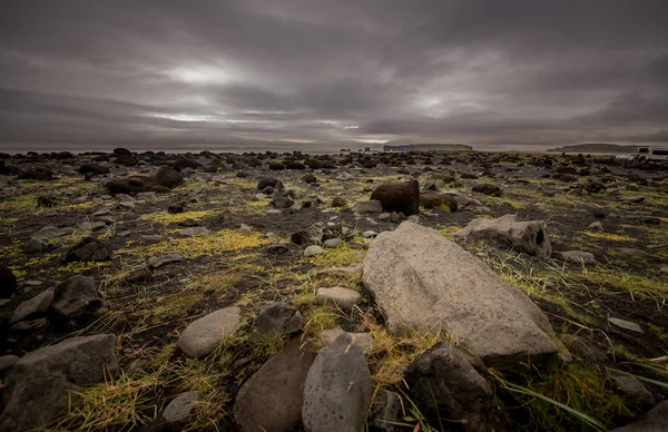 Unusual landscapes of Iceland near the black sandy beach.