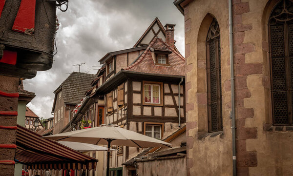 France. Alsace Riboville -July 2019: facades of old houses in the historic city center on a summer day.