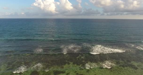 Aerial drone birds eye view video on sea waves and rocks, turquoise water. tropical paradise pacific atoll islands. Top view. Shot in 4k — Stock Video