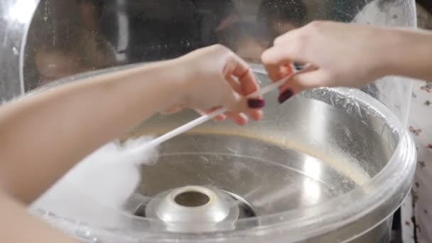 Process of Making of Cotton Candy in slow motion. Close-up on machine and female hands. Candyfloss. Apparatus for cotton candy. Full hd — 비디오