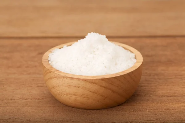 Sea salt in wooden bowl — Stock Photo, Image