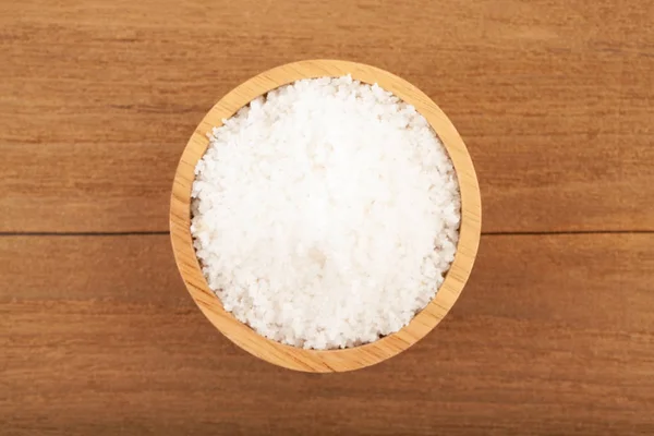 Sea salt in wooden bowl — Stock Photo, Image