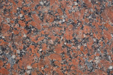 Turuncu, gri, beyaz, siyah karışımlı granit yüzey. Uzayı kopyala Minimalizm.