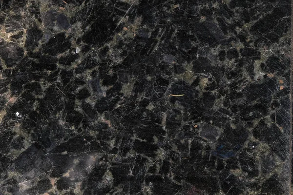 Black and gray granite surface. Copy space. Minimalism.