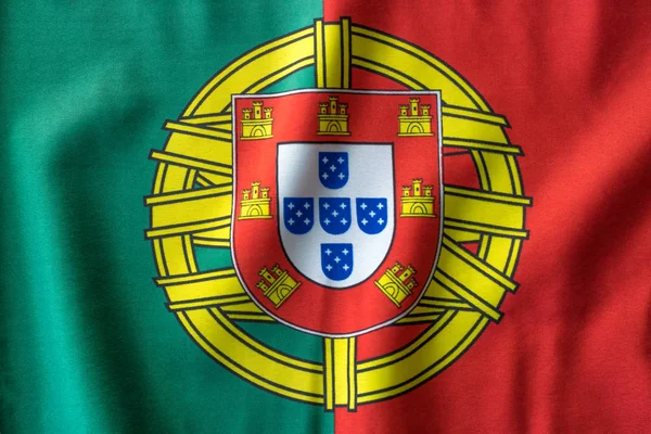 Португальська прапор махав — стокове фото