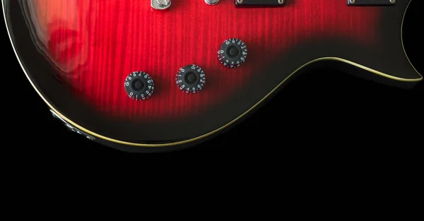 Una guitarra negra y roja sunburst guitarra de color . — Foto de Stock