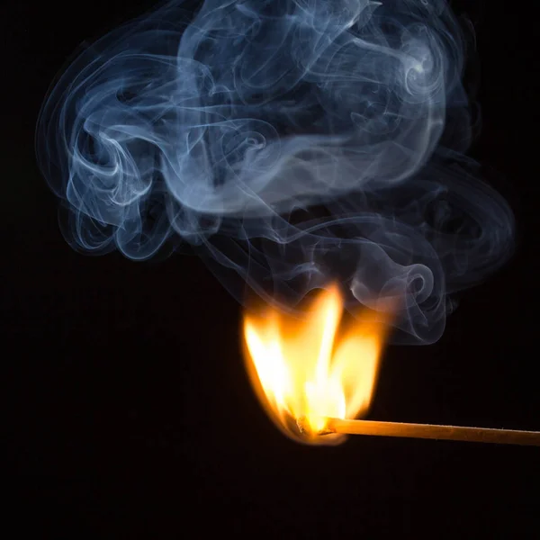 Ignition of the match with smoke individually on black background — Stock Image Ignition Match Smoke Individually Black Background Stock Photo
