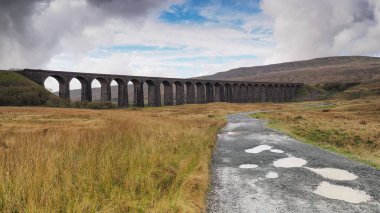 Ribblehead Viaduct or Batty Moss Viaduct carrying the Settle to Carlisle railway, Yorkshire Dales clipart