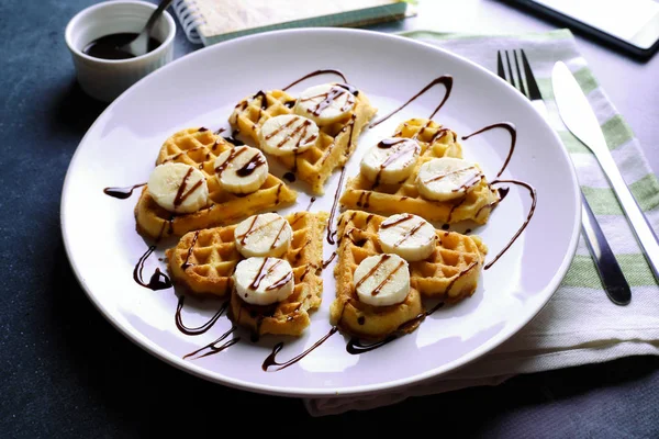 Plate Belgian Waffles Chocolate Sauce Bananas Dark Gray Background — Stock Photo, Image