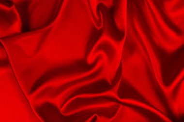 Kırmızı ipek veya sadan lüks kumaş doku soyut geri olarak kullanabilirsiniz