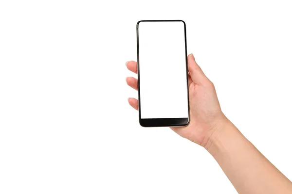 โทรศัพท์สมาร์ทโฟนในมือของผู้หญิงที่แยกจากพื้นหลังสีขาว สีขาว — ภาพถ่ายสต็อก
