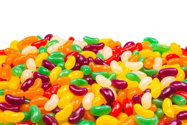 Kleurrijke jelly beans geïsoleerd op wit. — Stockfoto