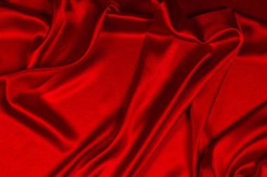 Kırmızı ipek veya sadan lüks kumaş doku soyut geri olarak kullanabilirsiniz