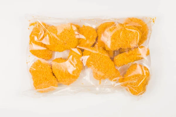 Packaging nuggets on a white background. — Stock Photo, Image