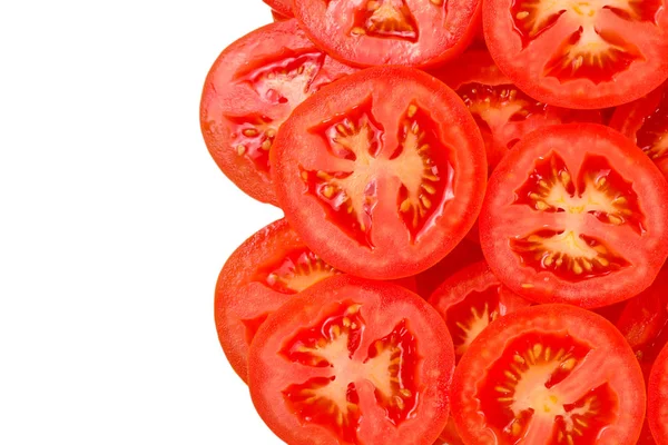 Tomatenhintergrund in Scheiben geschnitten. Ansicht von oben. — Stockfoto