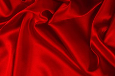 Kırmızı ipek veya sadan lüks kumaş doku soyut geri olarak kullanabilirsiniz
