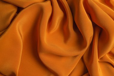 Altın ipek ya da saten lüks kumaş dokusu soyut b olarak kullanılabilir.