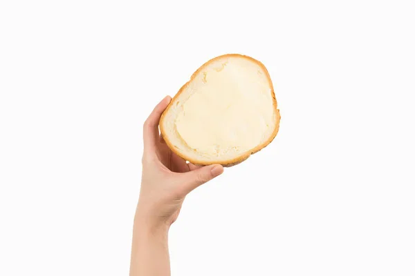 Ekmek ve tereyağı, beyaz arka planda elle izole edilmiş bir kadın.. — Stok fotoğraf