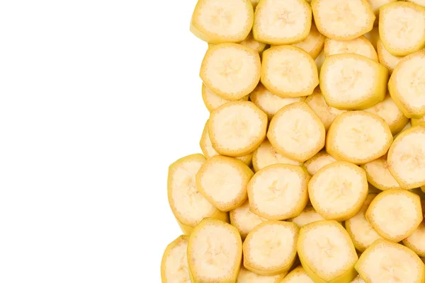 Čerstvé banánové plátky pozadí. Horní pohled. — Stock fotografie