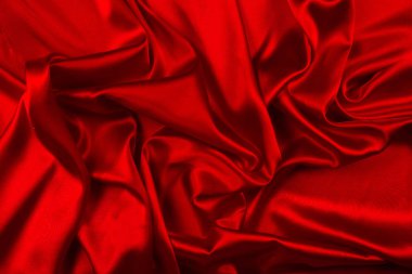 Kırmızı ipek veya sadan lüks kumaş doku soyut geri olarak kullanabilirsiniz
