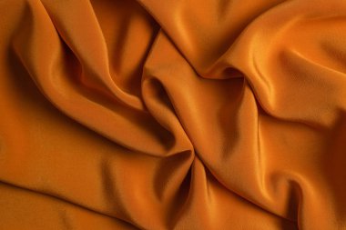 Altın ipek ya da saten lüks kumaş dokusu soyut b olarak kullanılabilir.