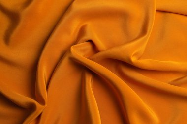 Altın ipek ya da saten lüks kumaş dokusu soyut b olarak kullanılabilir.